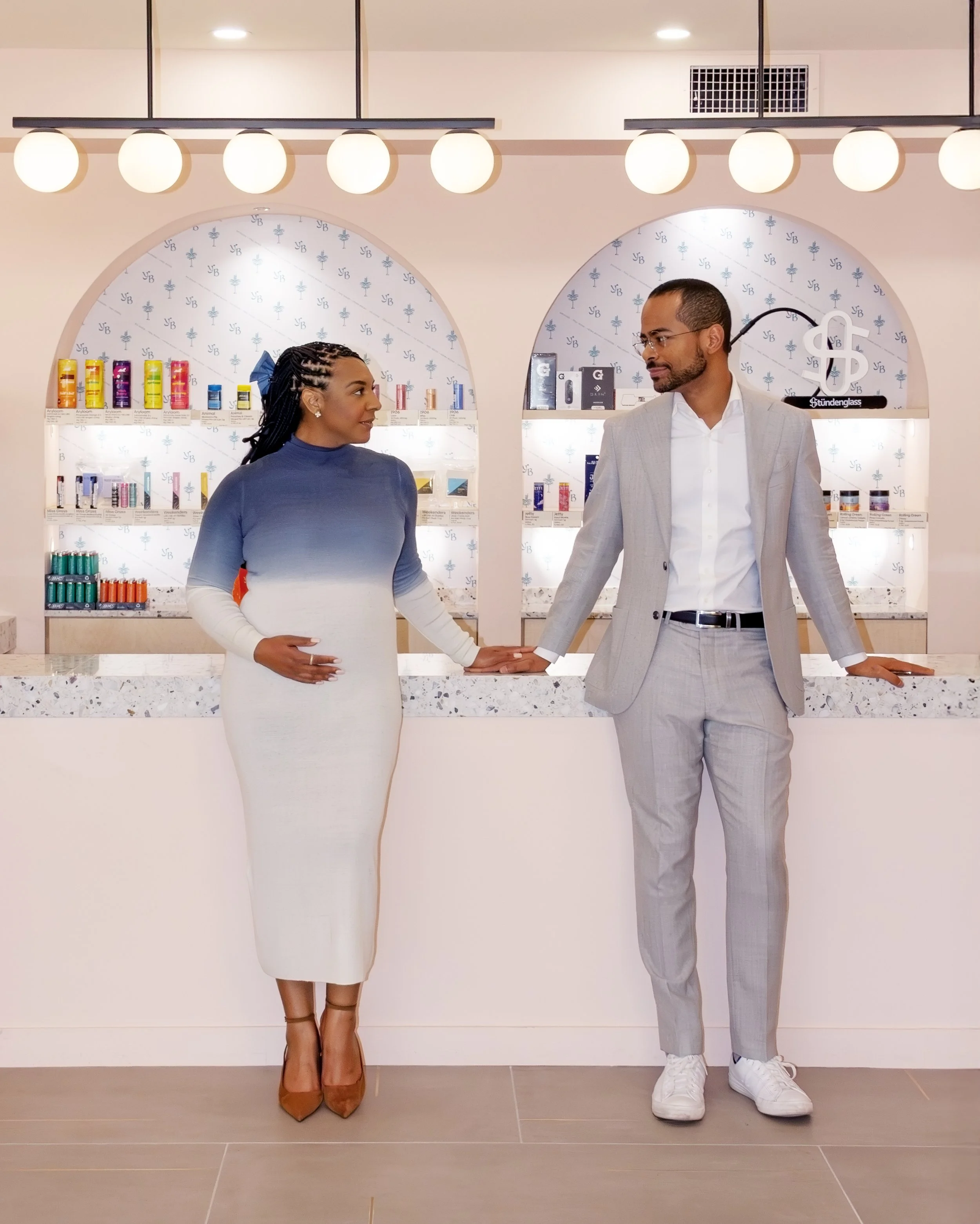 Doralyn Brito and Diógenes Brito, founders of Yerba Buena, looking at each other lovingly